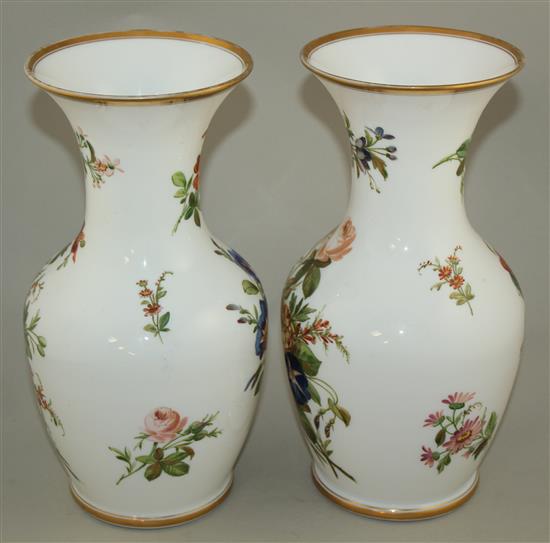 A pair of French enamelled opaline glass vases, mid 19th century, 29.5cm